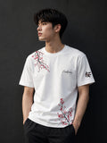 Sakura Blossom Minimalist Japanese Aesthetic Oversized T-Shirt | Elegant Floral Streetwear